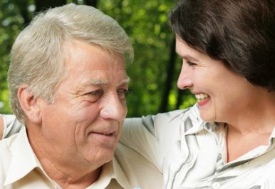Portrait of attractive senior happy smiling cheerful couple embracing, outdoors